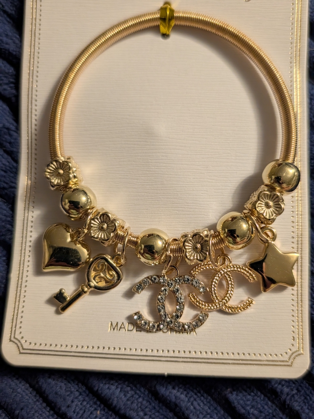 Gold Charm Bracelet with Heart, Star, Key and Interlocking Logo Charms